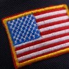 American flag patch on a sleeve.