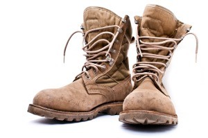 A pair of tan Army boots.