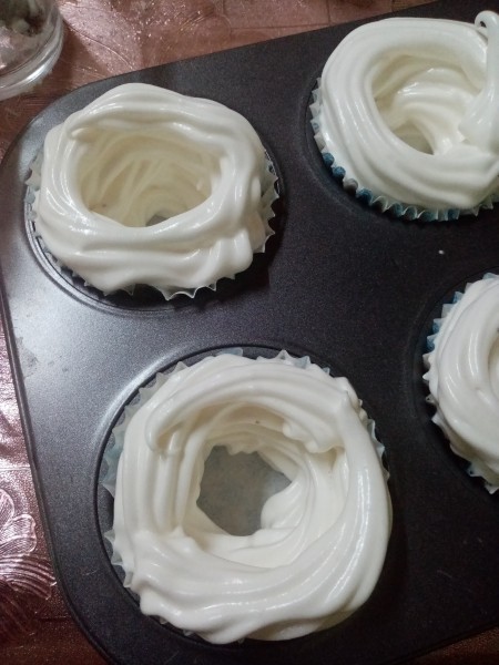 meringue piped into paper cups