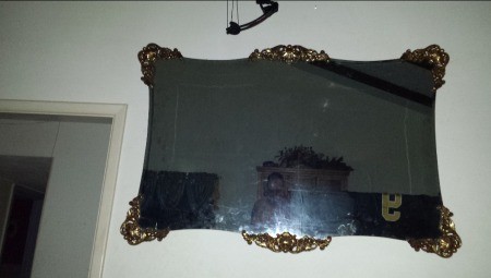 Age and Value of a Bassett Mirror - frameless mirror with decorative floral wood or metal corners and centers