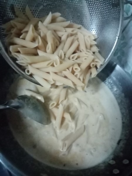 adding Penne to pan