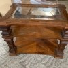Value of a Mersman End Table - glass topped end table with center shelf
