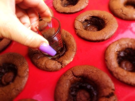 reform bottom of cup with shot glass in baked cookie cup