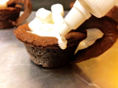 adding icing spill to side of mug cookie Mug Cookies