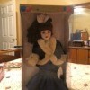 Value of 1999 Brass Key Camellia Garden Doll- doll in long blue dress with a white fur trimmed jacket