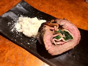 steak pinwheel on plate