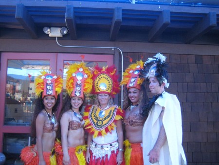 Tahitian dancers with colorful headdresses.
