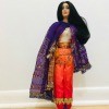 Identifying a Porcelain Doll - doll with long black hair wearing purple shawl, orange pants with gold trim