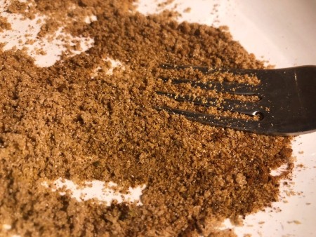 mixing seasoning for fries