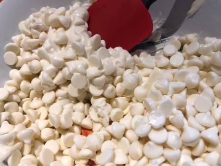 UFO Cow Abduction Cake - white chocolate chips in a bowl