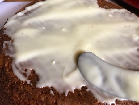 UFO Cow Abduction Cake - spread the ganache on the large cake, allow to dry while rolling out fondant