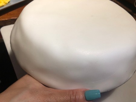 UFO Cow Abduction Cake - fondant draped on the large cake and trimmed