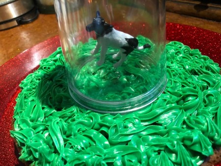 UFO Cow Abduction Cake - carefully place the tumbler in the center of the grass