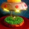UFO Cow Abduction Cake - cake with the fairy lights in place