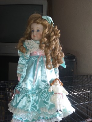 Value of Betty Jane Carter Dolls - doll with hair in long ringlets and wearing a light blue satin dress