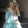 Value of Betty Jane Carter Dolls - doll with hair in long ringlets and wearing a light blue satin dress