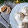 A plate of Christmas meringue cookies.