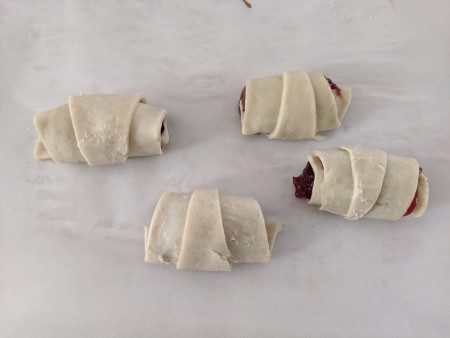 rolled, filled pastry ready to bake