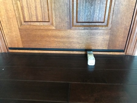 A door stop alarm in front of the door.