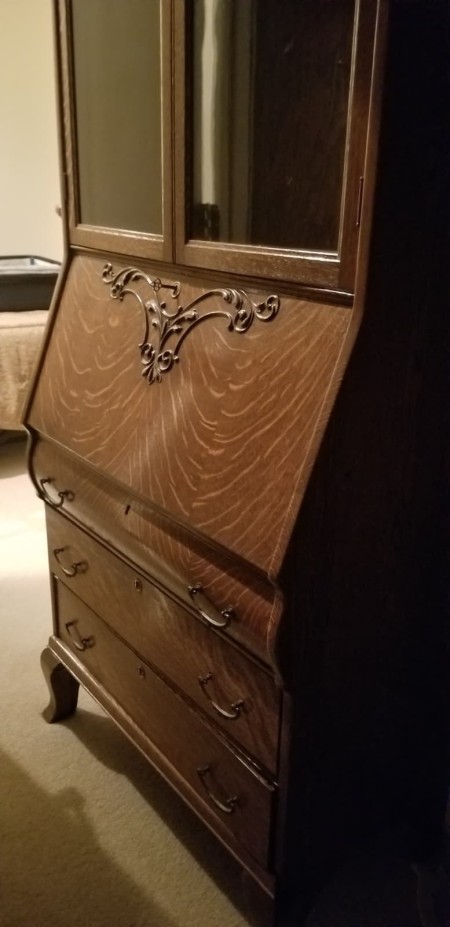 Value of an Antique Secretary Desk - drop front desk with glass doors and three drawers
