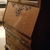 Value of an Antique Secretary Desk - drop front desk with glass doors and three drawers