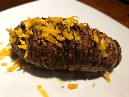 cheese on Crispy Potato on plate