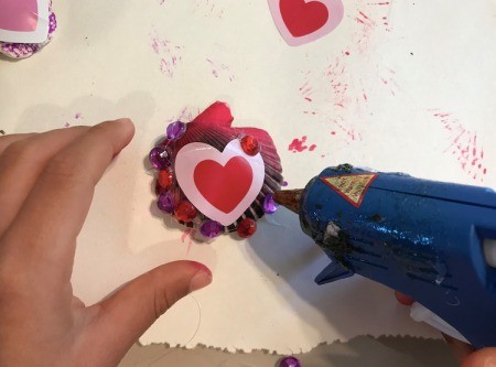 Wall Shell Decoration for Valentine's Day - add a heart sticker and hot glue on rhinestones