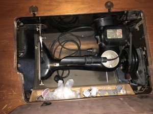 Value of an Antique Singer Sewing Machine - machine down in the cabinet