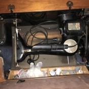 Value of an Antique Singer Sewing Machine - machine down in the cabinet