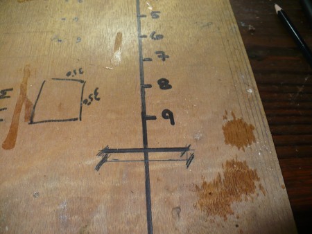 Making A Beading Loom - draw a straight line 2 inches up from the end, on the center line, repeat at the other end