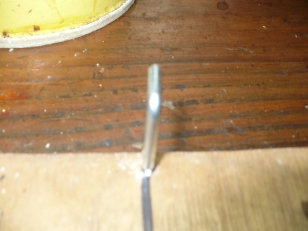 Making A Beading Loom - place an l-shaped screw hook at each end of the long center line