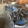 Value of a 1945 Worldwind Toro Riding Mower - old mower with a seat in tandem with the mower