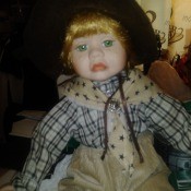 Value of a Granville House Doll - doll wearing a neck scarf and plaid chirt