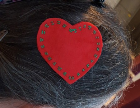 Felt Heart Hair Clip - finished heart clip in a woman's hair