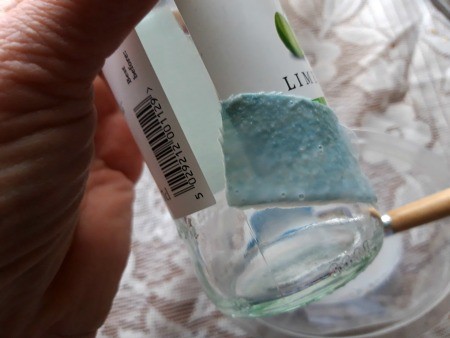 Fabric Covered Specimen or Bud Vase - apply fabric to the bottle and smooth with the brush