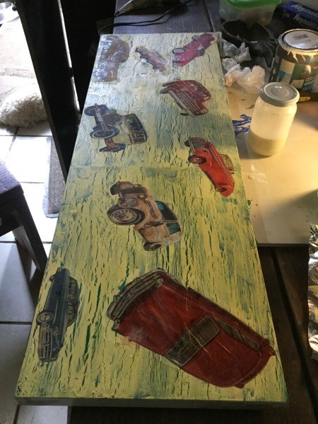 Creating a Crackle Paint Finish on Canvas - arrange cutouts and then glue in place