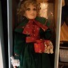 Value of a Betty Jane Carter Doll - doll wearing a long dark green coat in a box