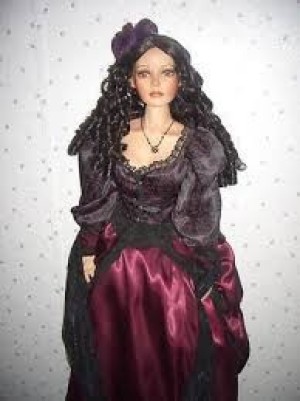 Value of a Paradise Galleries Doll - doll wearing a dark maroon gown with a dark bodice
