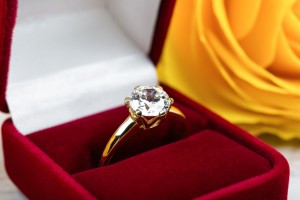 Engagement ring in a red box.