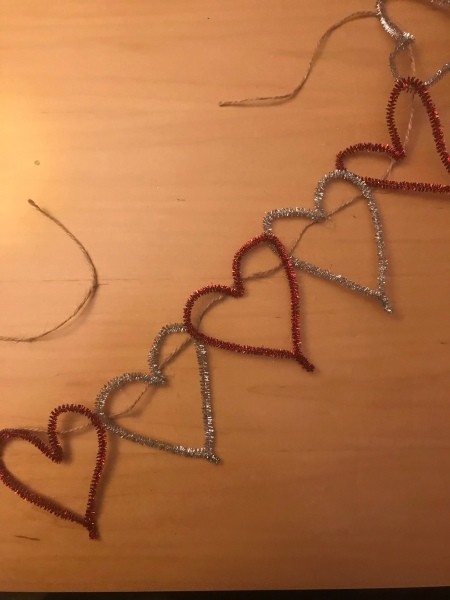 Making a Tinsel Pipe Cleaner Heart Garland - pipe cleaners attached to a length of twine