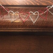Making a Tinsel Pipe Cleaner Heart Garland - garland hanging