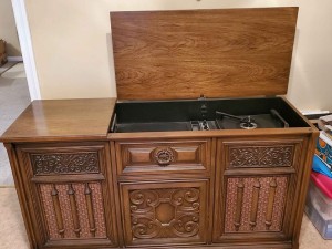 Value of a Magnavox Console Stereo - stereo cabinet with the top open