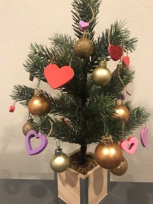 Valentine's Day Ornaments - tree decorated with heart ornaments and small gold balls