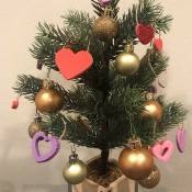 Valentine's Day Ornaments - tree decorated with heart ornaments and small gold balls