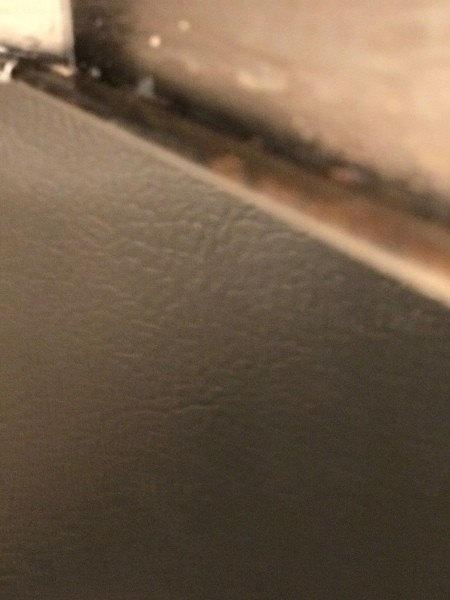 A grungy stovetop hood.