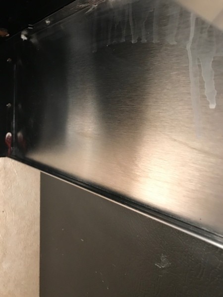 A clean stovetop hood.