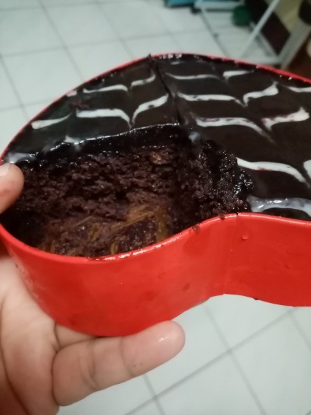 piece of cake cut from Heart Shaped Tin Cake