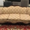 How Old Is My Sofa? - upholstered couch with dark wood trim