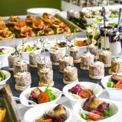 A table of catered food, for a party.