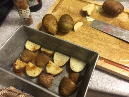 cut potatoes in pan